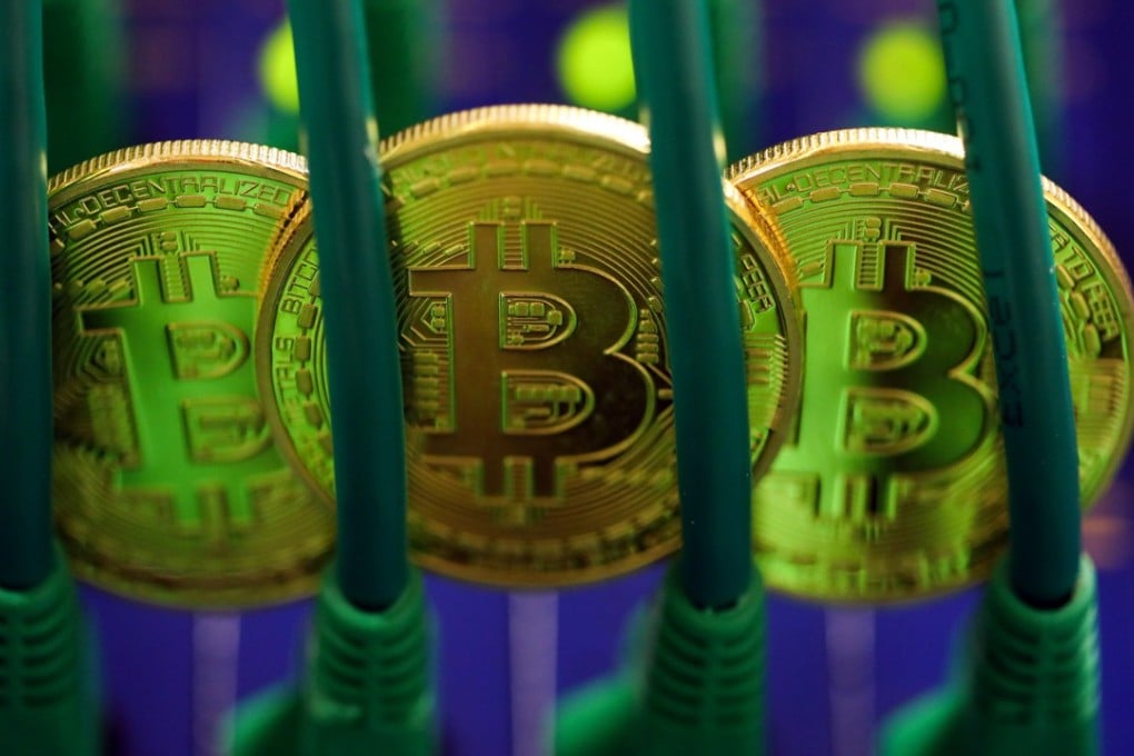 Bitcoins sit among Ethernet cables in this file photo. Despite its crackdown on bitcoin exchanges and initial coin offerings, China remains interested in grasping the underlying blockchain technology and creating its own sovereign digital currency. Photo: Bloomberg