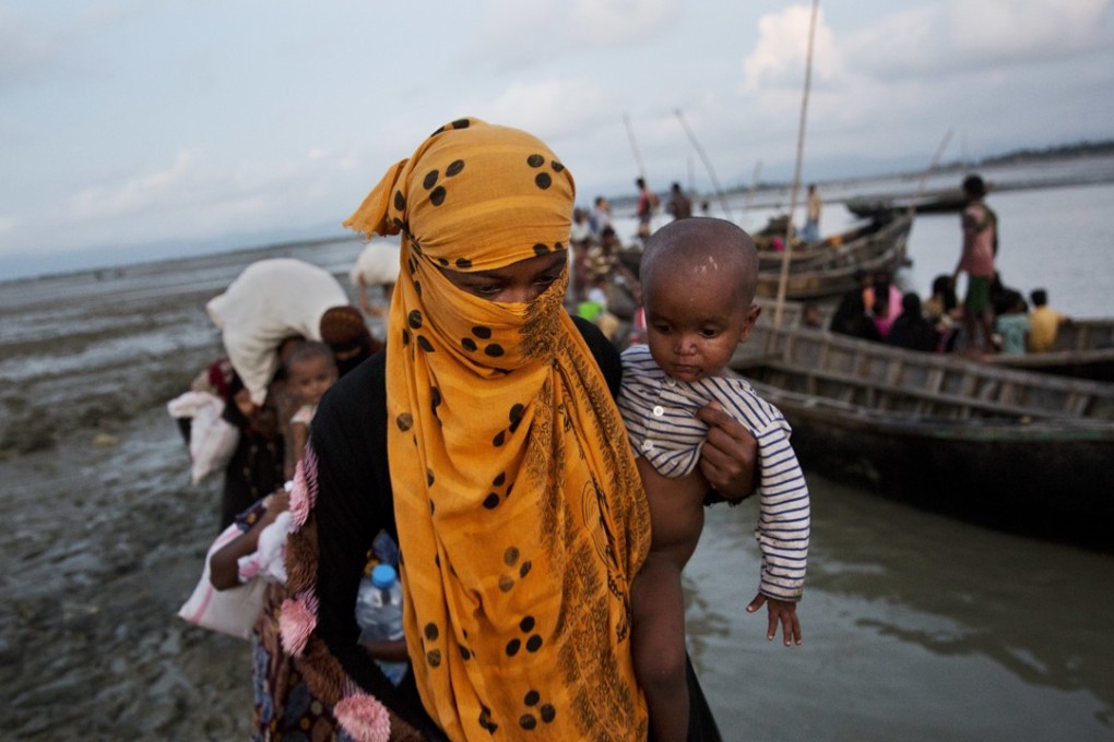 Agencies in Bangladesh say the number of Rohingya flooding over the border from Myanmar is now starting to decline. However, witness accounts of the violence in Rakhine state say there are still thousands waiting on beaches for boats or hiding in jungles. Photo: AP