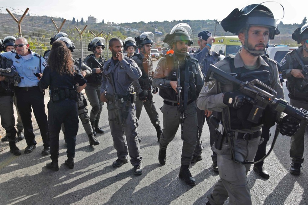 Palestinian gunman shot dead after killing three Israelis at West Bank ...