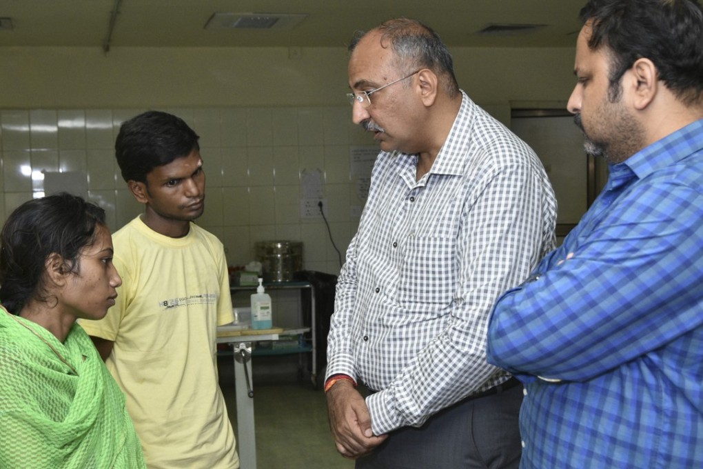 Nilesh Mandlewala (3rd from left), the head of Donate Life NGO, asks Sunil and Kiran Shah, parents of 14-month-old Somnath, if his organs could be used after doctors pronounced him brain-dead.