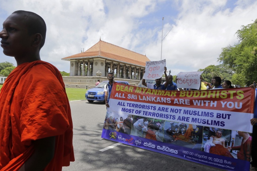 Sri Lankan Buddhists led by a monk march in a rally in Colombo, Sri Lanka, on September 15, claiming solidarity with Myanmar’s majority Buddhists and denouncing the Rohingya minority as terrorists. UN officials and others say the Rohingya are victims of a campaign of ethnic cleansing. Photo: AP