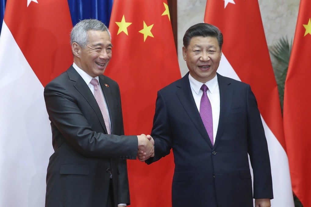 Chinese president Xi Jinping (right) welcomed Singapore Prime Minister Lee Hsien Loong to Beijing as the two sides seek to patch up relations following months of tensions over China’s claims in the South China Sea and relations with the US. Photo: AP