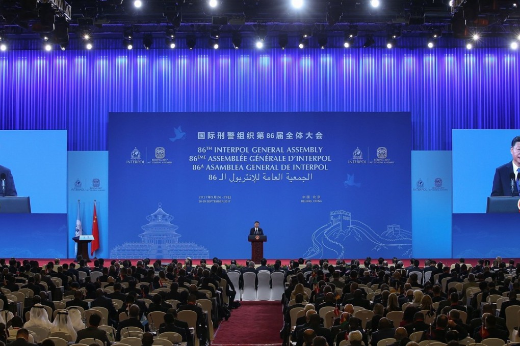 China’s President Xi Jinping speaks at the opening of the 86th Interpol General Assembly at the Beijing National Convention Centre in the Chinese capital on Tuesday. Photo: AFP