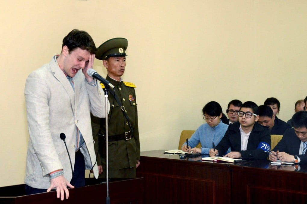 US student Otto Warmbier cries at his trial in Pyongyang, North Korea, on March 16, 2016. Photo: Reuters