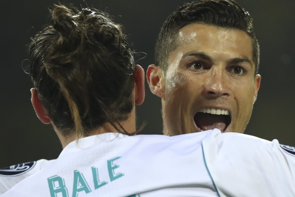 Ronaldo celebrates with Gareth Bale. Photo: EPA