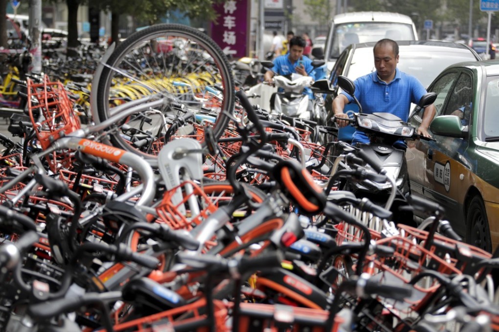 GSR Ventures, an investor of Ofo says a merger of Ofo and Mobike is the only way for China’s two biggest bike-sharing operators to become profitable. Photo: AP