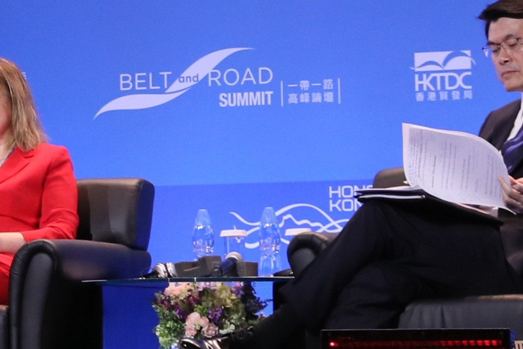 Justyna Skrzydło, Poland’s deputy minister of infrastructure and construction, speaks at the Belt and Road Summit 2017 in Hong Kong, while Edward Yau Tang-wah, Secretary for Commerce and Economic Development, listens.