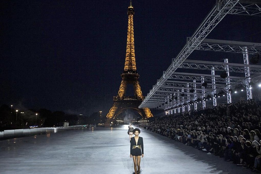 A model presents a creation from the Spring/Summer 2018 Ready to Wear collection by Belgian designer Anthony Vaccarello for Saint Laurent during the Paris Fashion Week, in Paris, France, 26 September 2017. The presentation of the Women's collections runs from September 25 to October 3. EPA