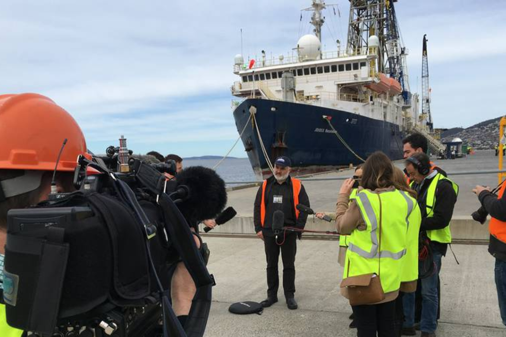 Expedition co-leader Professor Rupert Sutherland speaks with media in front of the JOIDES Resolution research vessel in Hobart, Tasmania. Photo: Supplied
