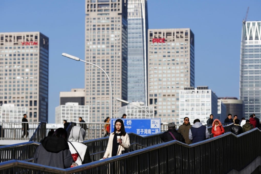 Beijing’s government plans to reduce the size of its inner-city population. Photo: EPA