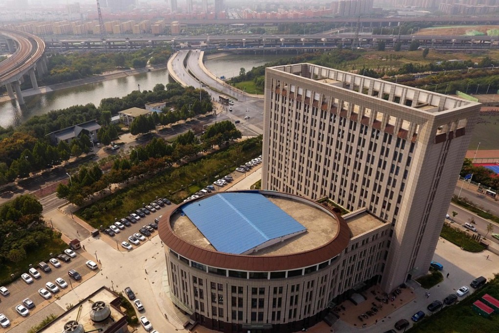 An aerial view of a university building in Zhengzhou in China's central Henan province that some say looks like a giant toilet. Photo: AFP