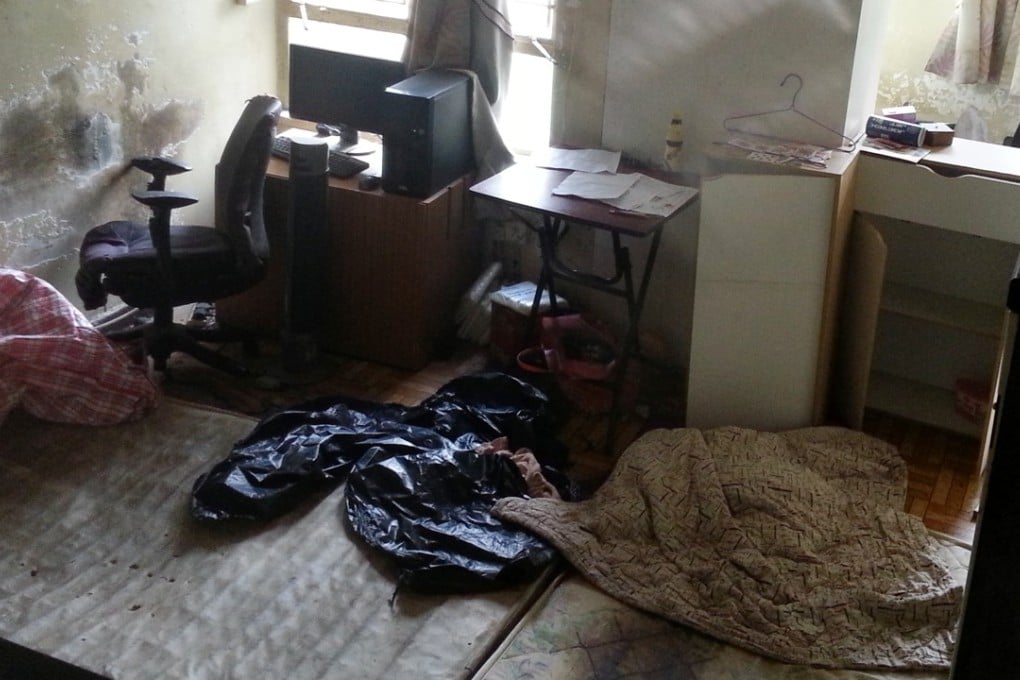 Police and fire officers found the two bodies in King On House, Shan King Estate. Photo: Handout