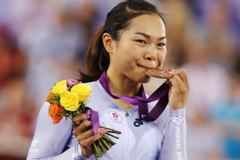 Lee Wai-sze bites her bronze medal at the London Olympics in 2012. Photo: SCMP