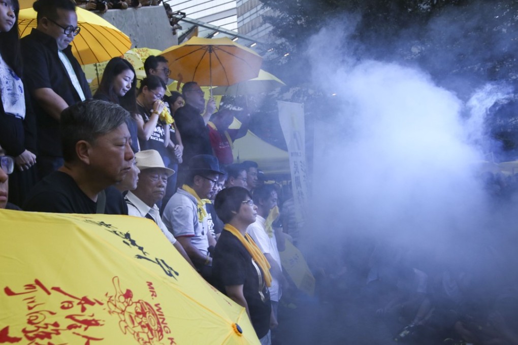 A rally on September 28, 2017 commemorating the third Anniversary of Occupy Central held a moment of silence at 5.58pm to mark the moment police fired tear gas at protestors during Occupy Central. Photo: Sam Tsang