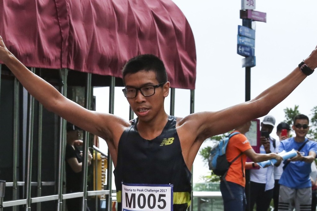 Ryan Yip Tung-hoi crosses the finish line, despite taking a wrong turn. Photos: Jonathan Wong