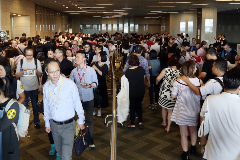 Long queues are seen at the sales office for the Wings at Sea project. Photo: Roy Issa