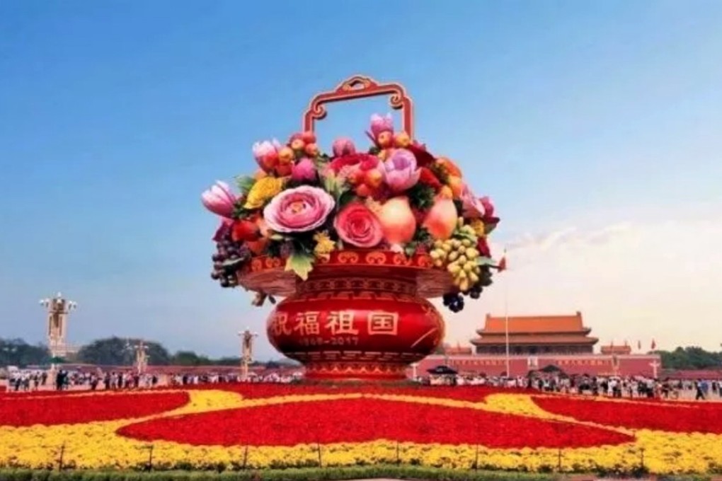 The giant floral display in Tiananmen Square stands 17 meters high and has a diameter of 50 metres at its base. Photo: Handout