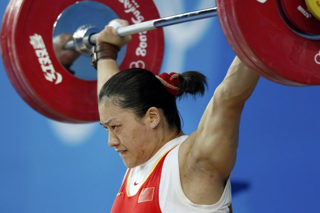 Cao Lei of China sets an Olympic record in the snatch competition at the Beijing 2008 Olympics. She was stripped of her medal following retests of samples. Photo: Reuters