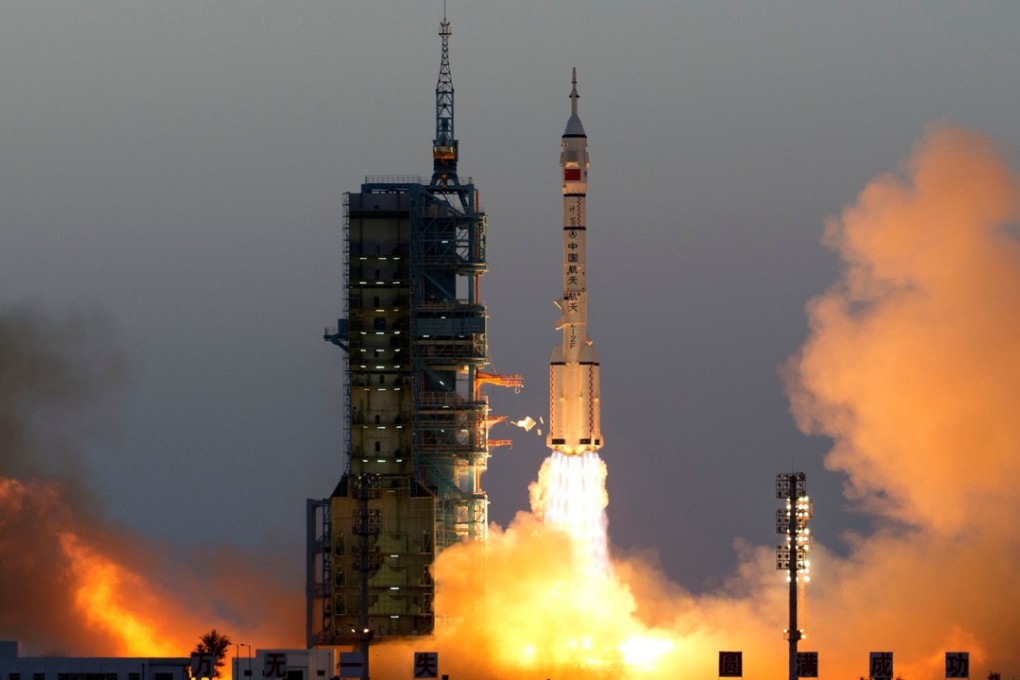 The Shenzhou-11 spacecraft carrying astronauts Jing Haipeng and Chen Dong and six silkworms blasts off from the launch pad in the Gobi Desert. Photo: Reuters