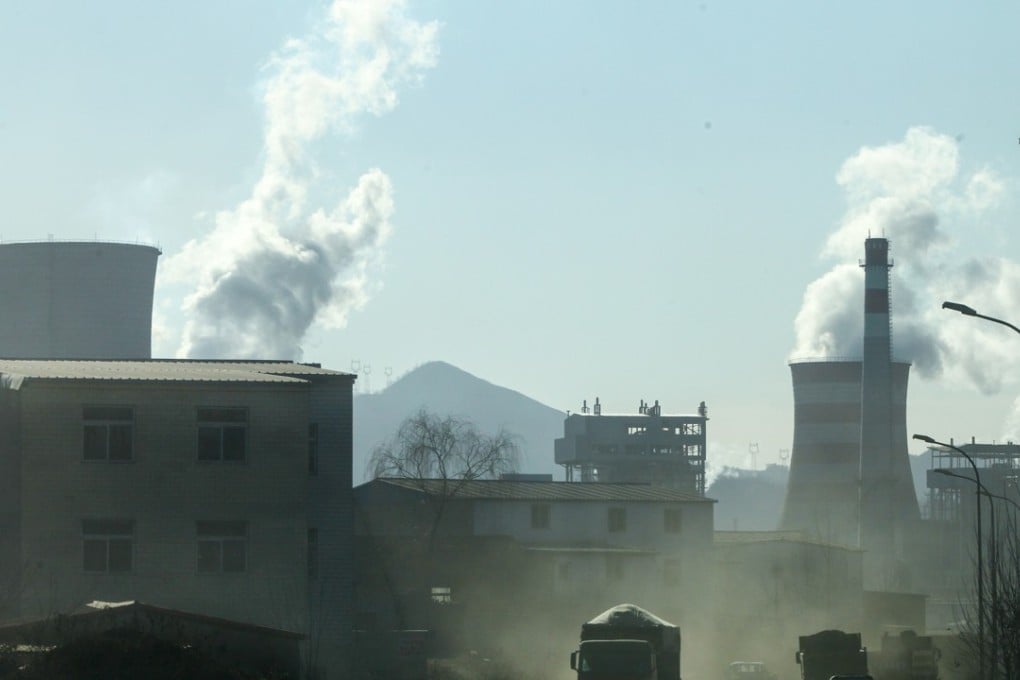 Smoke billows from factories in northern China’s Hebei province. Beijing’s push to reduce pollution could cut economic growth by 0.25 percentage points in the next six months, Paris-based Societe Generale said. Photo: Simon Song