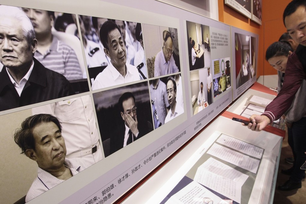 Visitors read statements of repentance written by fallen top officials at an exhibition in Beijing highlighting the achievements made during five years of leadership by President Xi Jinping. The six are, from upper left to bottom right, Zhou Yongkang, Bo Xilai, Guo Boxing, Xu Caihou, Sun Zhengcai and Ling Jihua. Photo: Simon Song