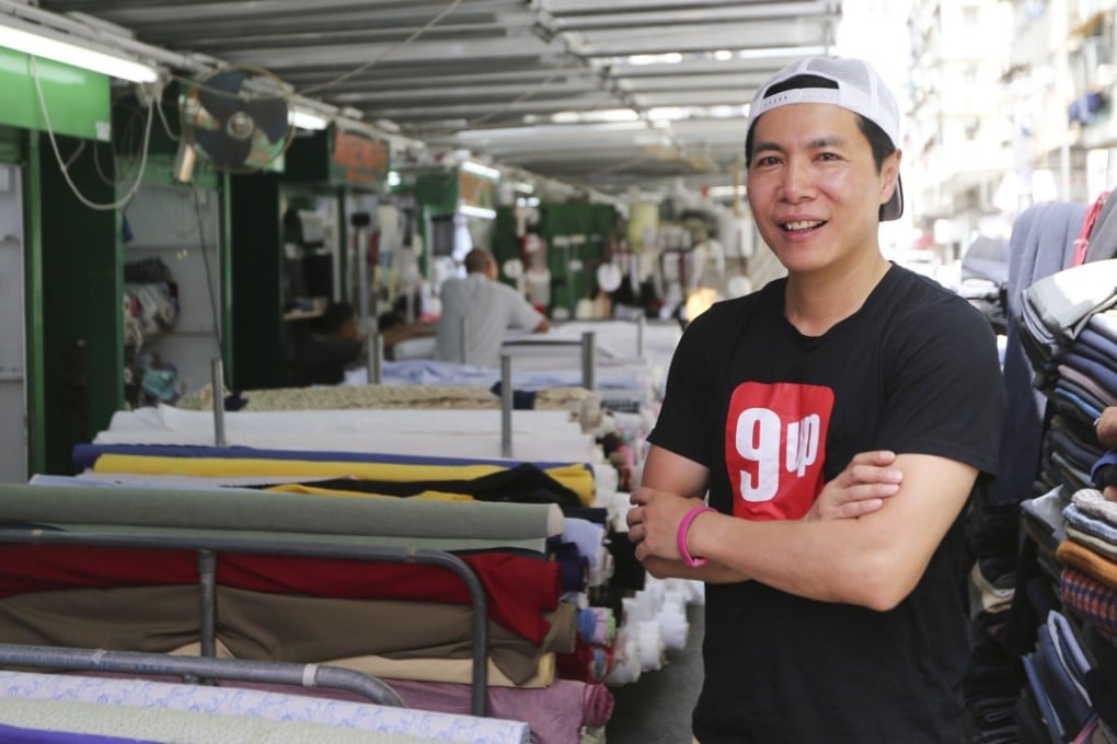 Douglas Young, founder and CEO of G.O.D (Goods of Desire), at the fabric market in Sham Shui Po, an area he’s long looked to for design inspiration. Photo: Xiaomei Chen