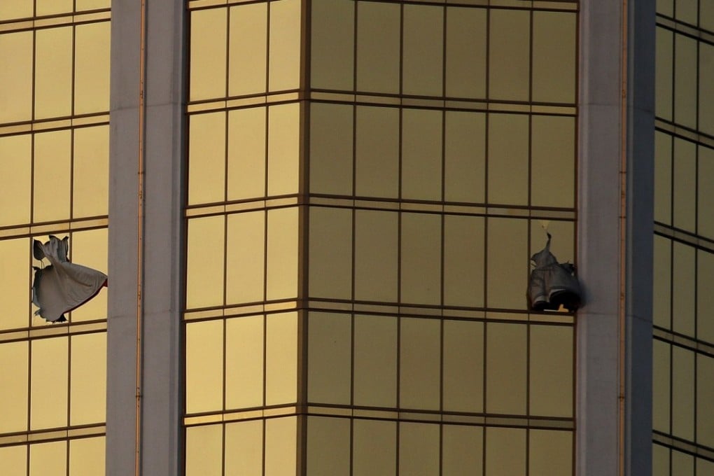 Authorities say Stephen Craig Paddock broke the windows of his hotel room and began firing with a cache of weapons, killing dozens and injuring hundreds. Photo: AP