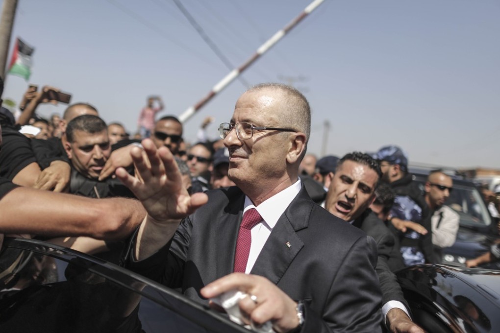 Rami Hamdallah, Prime Minister of the Palestinian Consensus Government, arrives at Beit Hanun in the Gaza Strip on Monday. Photo: Xinhua