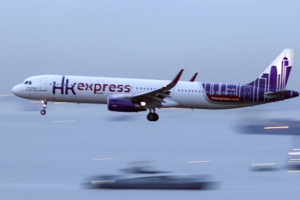 A Hong Kong Express aircraft is seen landing at Hong Kong International Airport. The Airlines has cancelled 18 flights that were due to fly to and from Hong Kong, South Korea, and Japan. 07SEP17 SCMP / Roy Issa
