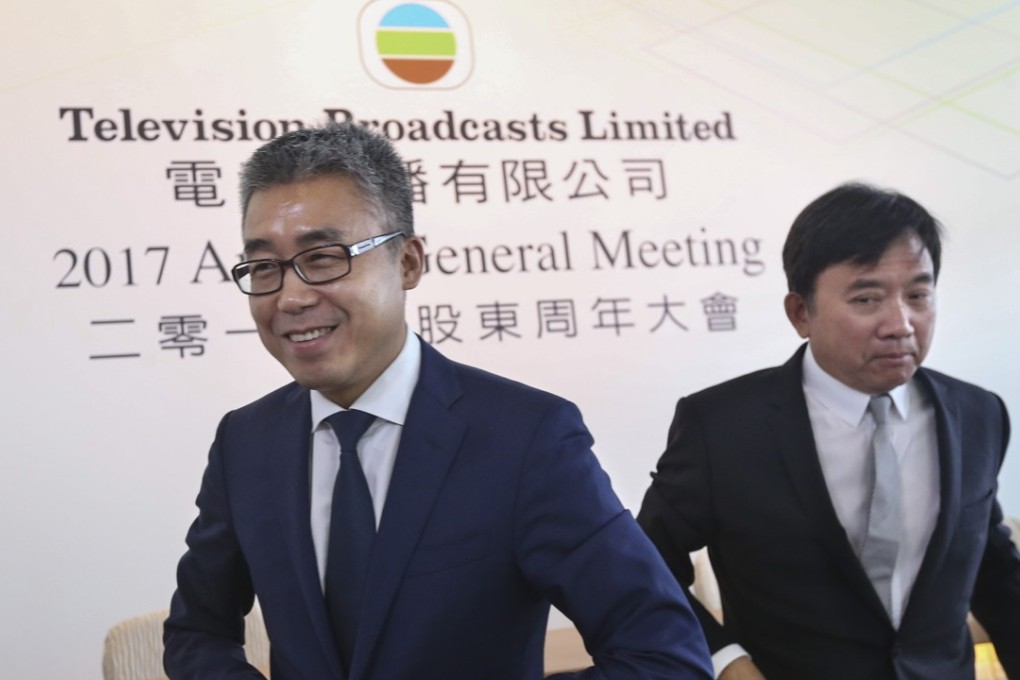 Li Ruigang (left) and TVB chairman Charles Chan Kwok-keung meet the media after the broadcaster’s annual general meeting in June this year. Photo: Felix Wong