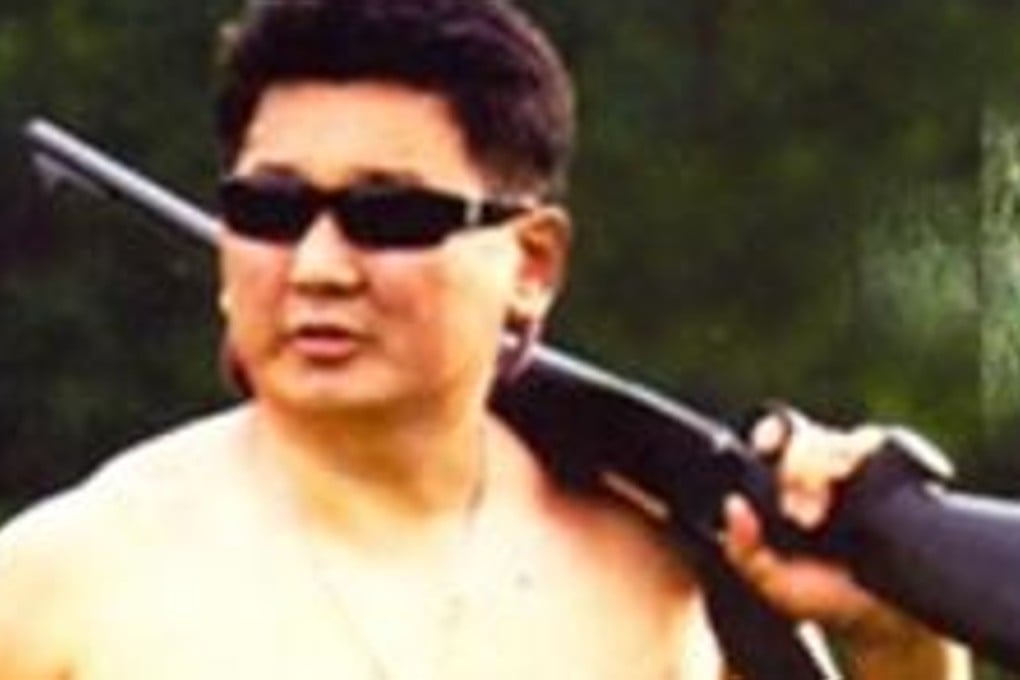 Ukhnaagiin Khurelsukh – a former deputy PM known for his macho image, having posed shirtless Putin-style with a gun. Photo: Wikimon