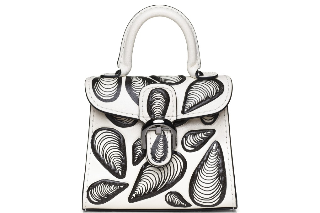 Travel in style with the croc leather passport holder from Midnight Factory