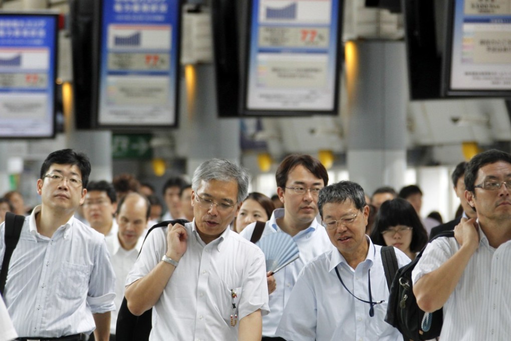 Japan's culture for punishingly long work hours has led to the death of a woman who logged 159 hours of overtime in a month. Photo: AP