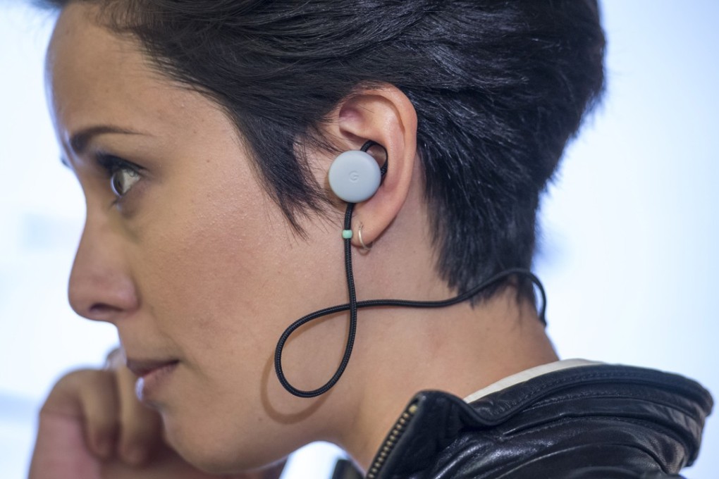 An attendee wears a pair of Google Pixel Buds wireless headphones during a product launch event in San Francisco. Photo: Bloomberg