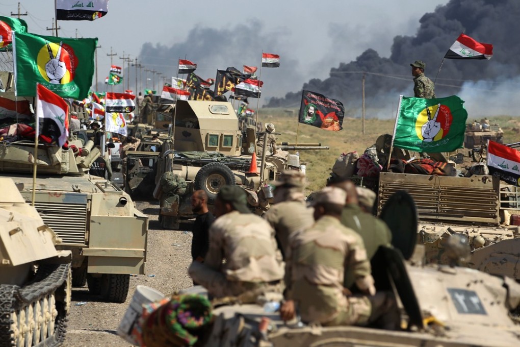 Iraqi forces and fighters from the Hashed al-Shaabi (Popular Mobilisation units) advance towards the Islamic State (IS) group's stronghold of Hawija. Photo: AFP
