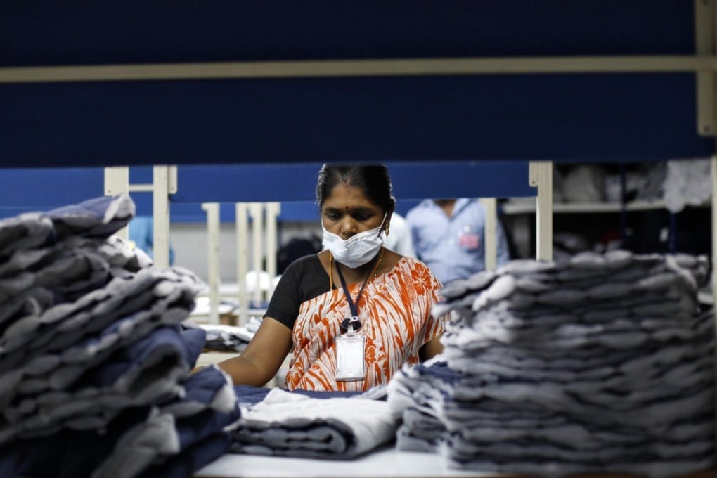 An employee sorts pieces of cloth in a garment factory in the southern Indian state of Tamil Nadu. Photo: Reuters/Mansi Thapliyal