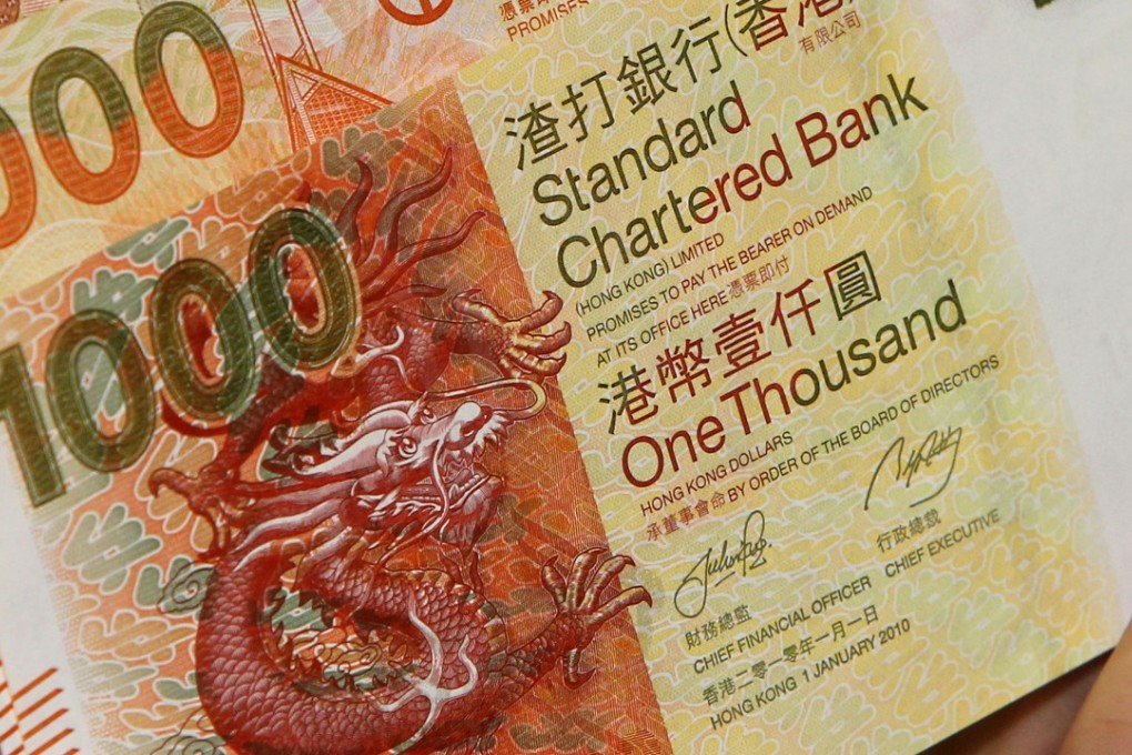 Regulators in Europe and Asia are believed to be investigating Standard Chartered, one of Hong Kong’s three currency issuing institutions, over the role staff may have played in transferring US$1.4 billion of private bank client assets from the island of Guernsey to Singapore, before new tax transparency rules were introduced. Photo: SCMP