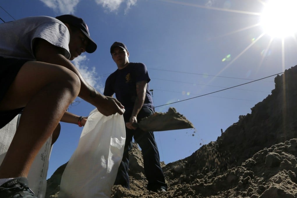 Members of the New Orleans Fire Department fill sandbags in preparation for Tropical Storm Nate in New Orleans, Louisiana, on October 6, 2017. Photo: Reuters