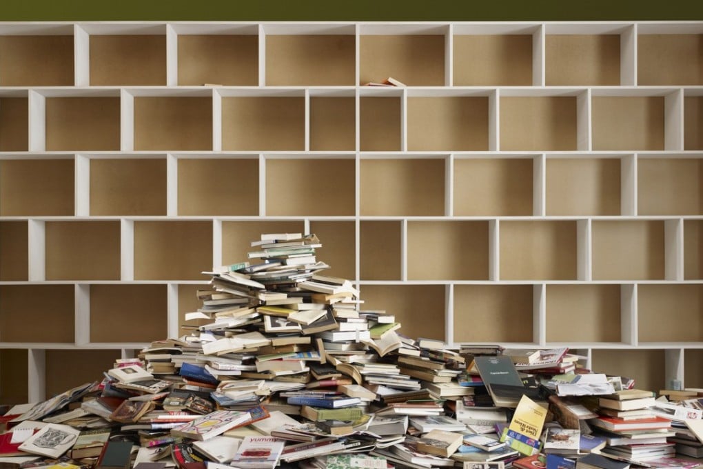 Books are especially prone to piling up over the years and are one of the more obvious targets when it comes to decluttering. Photo: Alamy