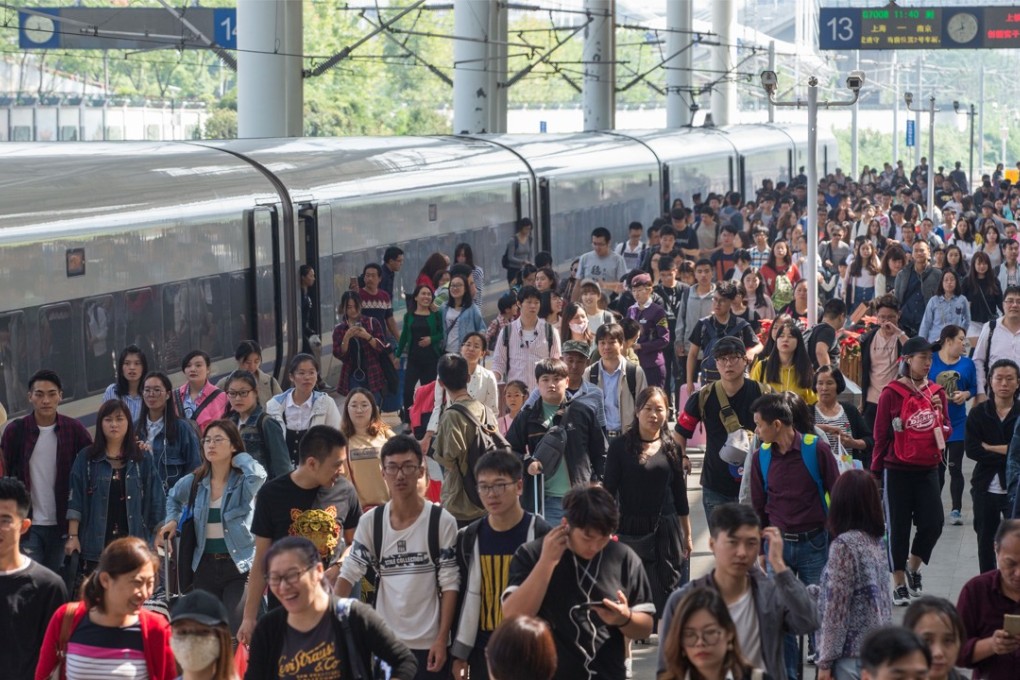 Heading home: the travel crush is under way at Nanjing Railway Station in eastern Jiangsu province on Saturday. Photo: Xinhua