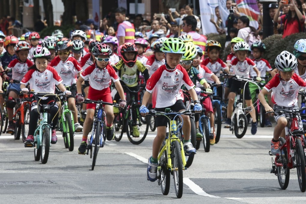Young riders compete in the Kids and Youth Rides event in Tsim Sha Tsui as part of Sunday’s cyclothon. Photo: Jonathan Wong
