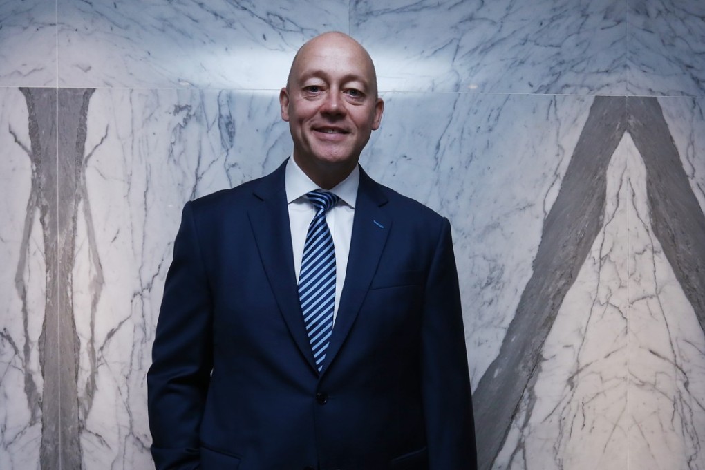 AIA Hong Kong CEO Peter Crewe says it would be naive to go fully digital for all transactions without first listening to what customers want. Photo: Jonathan Wong