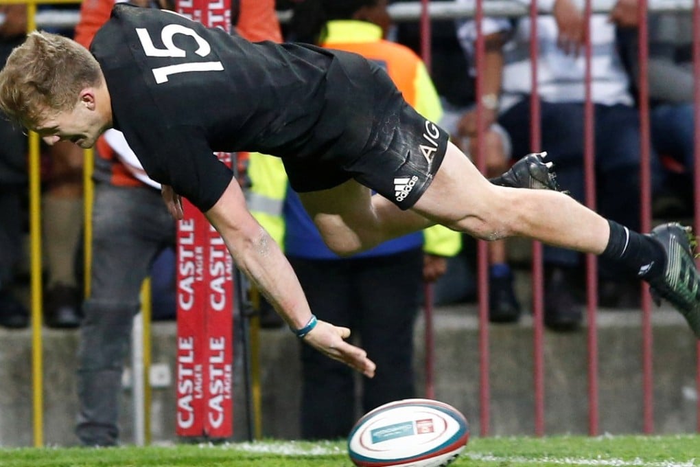 The mercurial Damian McKenzie scores the crucial try, helping the All Blacks build an eight-point advantage. Photo: Reuters