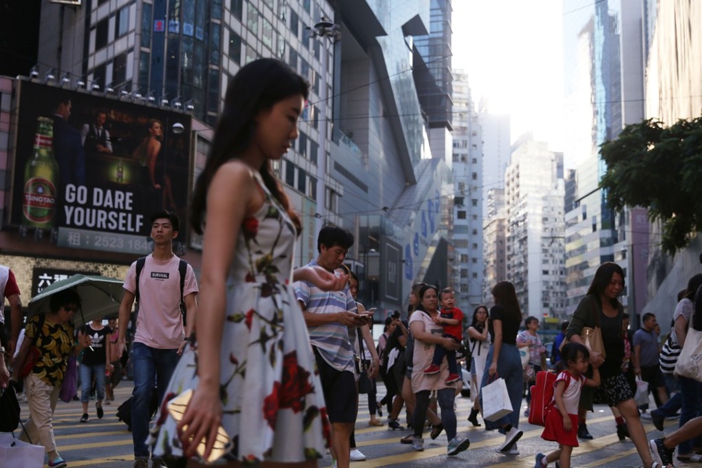 About two-thirds of those polled said they were happy with their lives. Photo: Sam Tsang