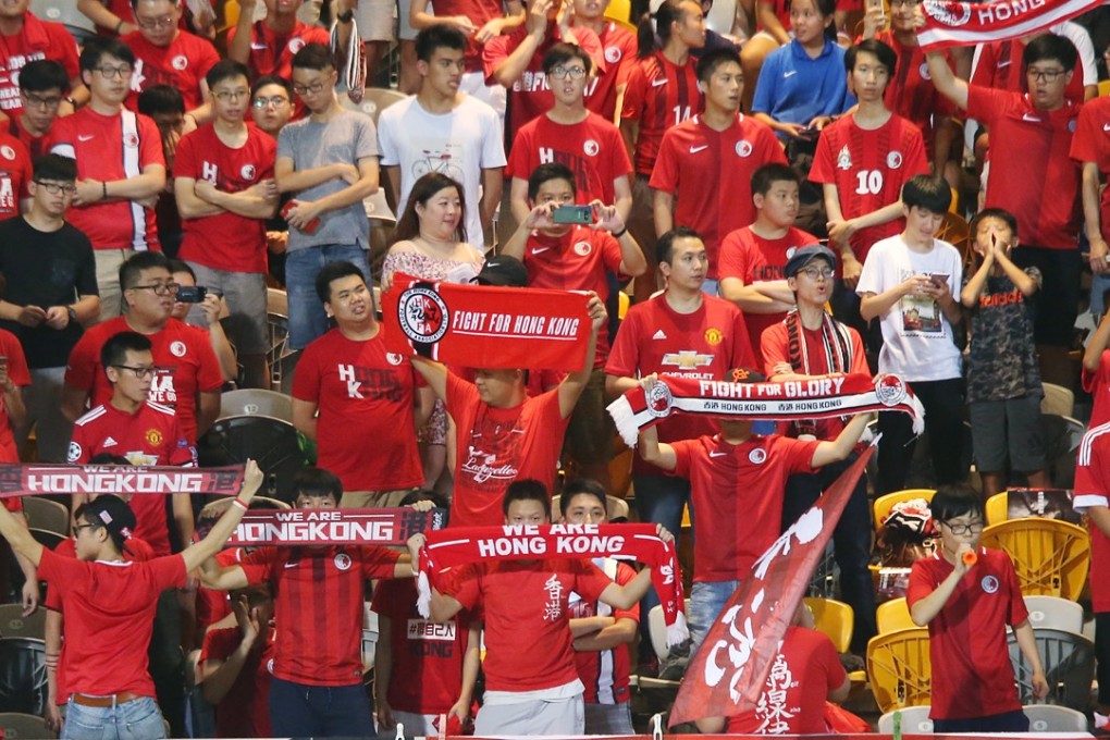 Hong Kong fans cheer on their team against Laos last week. Photo: David Wong