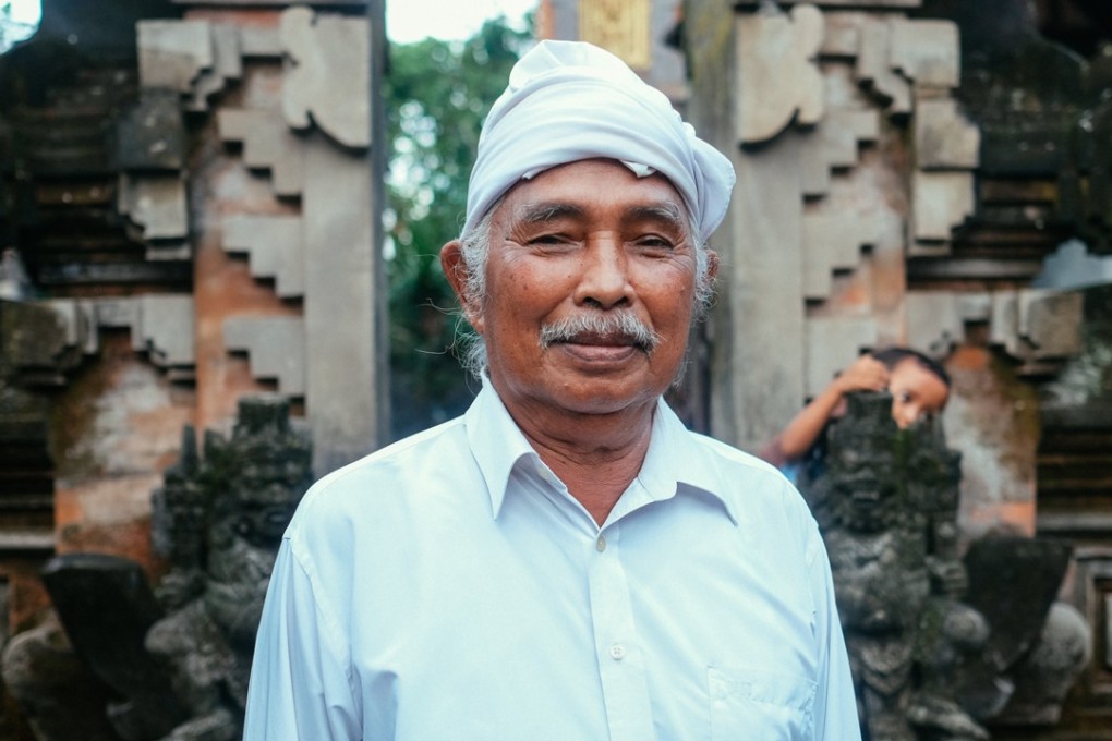 Jro Mangku Made Gudug has been leading prayers for the safety of the local people since the first official volcanic alert was issued. Photo: Sara Calloway