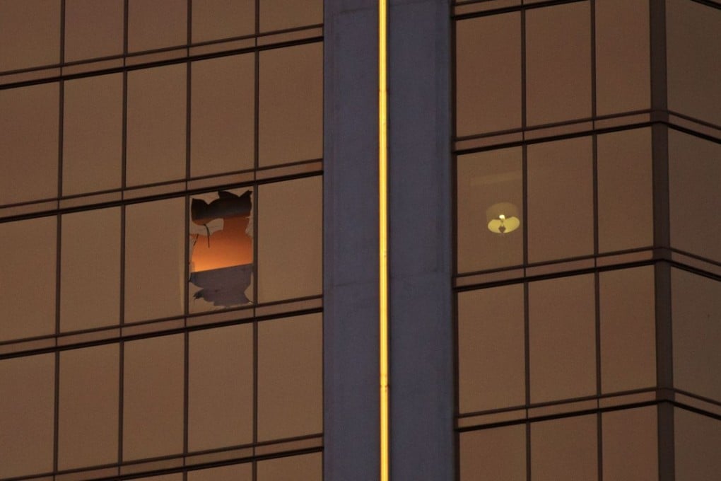 A smashed window in Room 32-135 of the Mandalay Bay Resort and Casino bears testimony to the mass slaughter conducted by Stephen Paddock, as he fired from the room into a crowd below on October 1. Photo: AFP