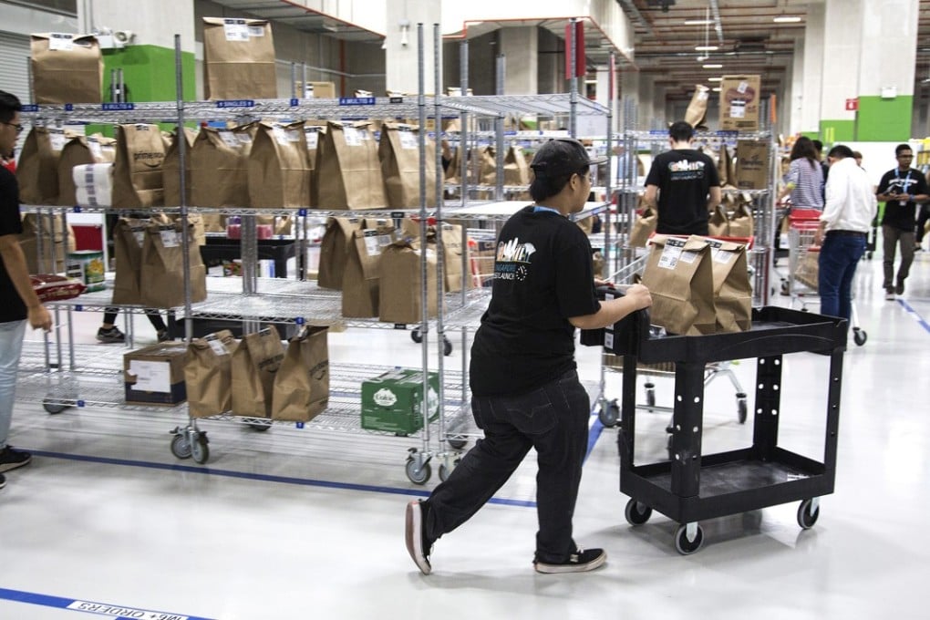 Competition aside, delivery delays have also marred Amazon’s debut in July. On-the-ground operations began with Prime Now two-hour deliveries. Photo: Bloomberg