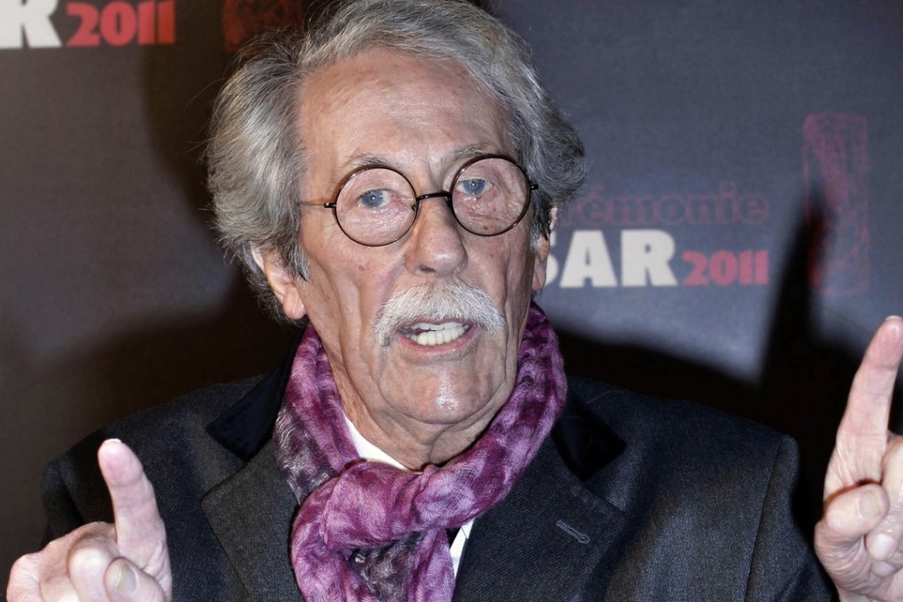 French actor Jean Rochefort gestures as he arrives at the 36th French Cesar Awards Ceremony in Paris. Rochefort, who starred in more than 100 films and made French audiences laugh and cry over the past 50 years with his comical roles and appealing personality, has died. He was 87. Photo: AP