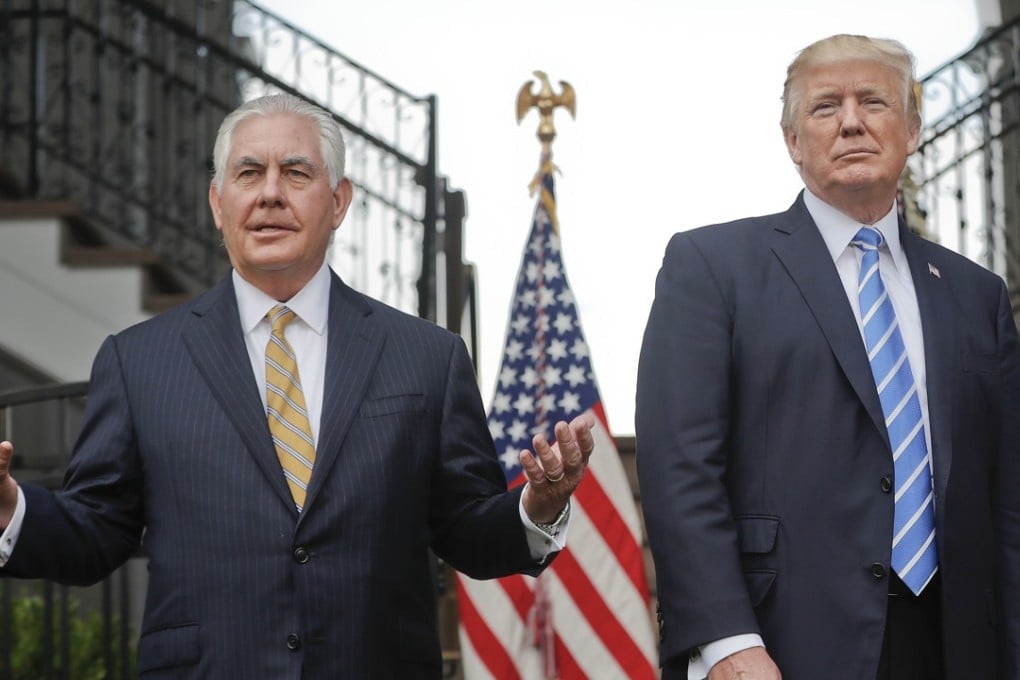 US Secretary of State Rex Tillerson, left, speaks following a meeting with President Donald Trump at Trump National Golf Club in Bedminster, New Jersey, in August. Photo: AP